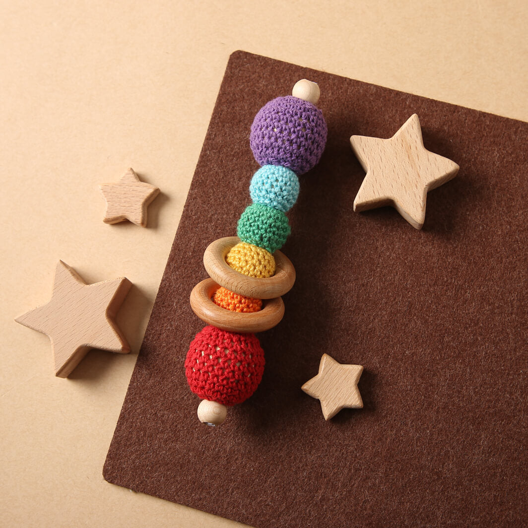 A sensory teething rattle CROCHET TOY for babies and young children - Helps exercise finger-gripping ability and enhance wrist power Montessori Learning Educational Gift idea Birthday Christmas Quality Wood Organic Wooden Toys Toddler Baby