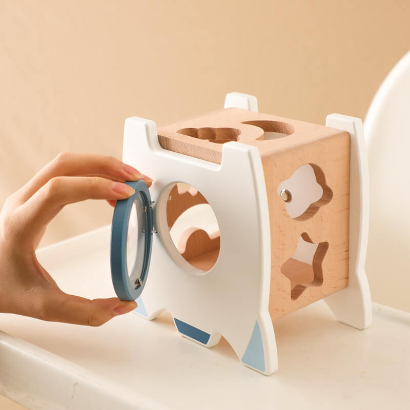 A wooden rocket toy with a shape pairing, a bottom door that opens to take out the input shape block, and a wheel for more fun. Great for cultivating hand-eye coordination. Montessori Learning Educational Gift idea Birthday Christmas Quality Wood Organic Wooden Toys Toddler Baby Board Games Puzzle